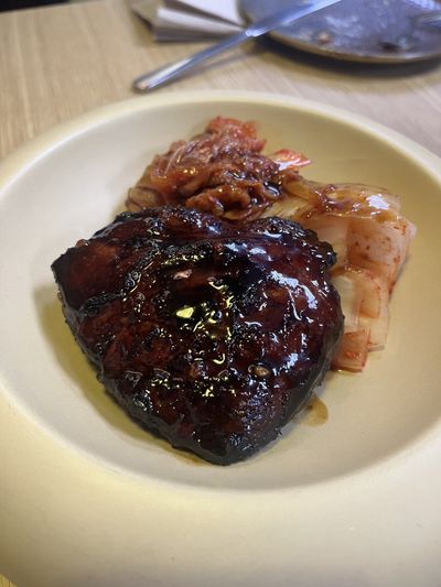Sweetbreads lacquered dark, served with kimchi